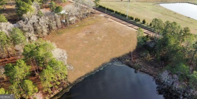 Nestled on the north edge of the Forest Lakes Golf Course on Forest Lakes Golf Club in Georgia - for sale on GolfHomes.com, golf home, golf lot