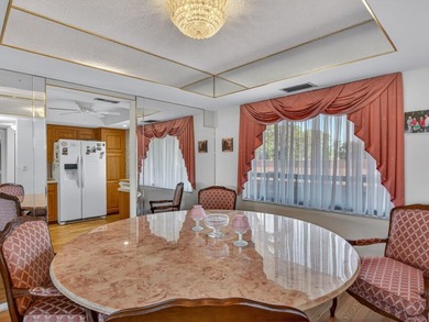 Wake up to fantastic panoramic views of the lake and golf course on  in Florida - for sale on GolfHomes.com, golf home, golf lot