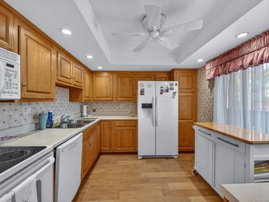 Wake up to fantastic panoramic views of the lake and golf course on  in Florida - for sale on GolfHomes.com, golf home, golf lot