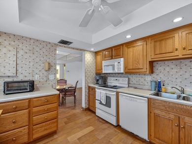 Wake up to fantastic panoramic views of the lake and golf course on  in Florida - for sale on GolfHomes.com, golf home, golf lot