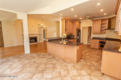 Proudly presenting this low-maintenance brick home located on on Ocean Ridge Plantation in North Carolina - for sale on GolfHomes.com, golf home, golf lot