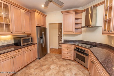 Proudly presenting this low-maintenance brick home located on on Ocean Ridge Plantation in North Carolina - for sale on GolfHomes.com, golf home, golf lot