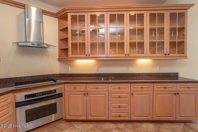 Proudly presenting this low-maintenance brick home located on on Ocean Ridge Plantation in North Carolina - for sale on GolfHomes.com, golf home, golf lot