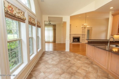 Proudly presenting this low-maintenance brick home located on on Ocean Ridge Plantation in North Carolina - for sale on GolfHomes.com, golf home, golf lot