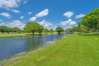 Immaculately kept in the sought after community of Century on Flamingo Lakes Country Club in Florida - for sale on GolfHomes.com, golf home, golf lot