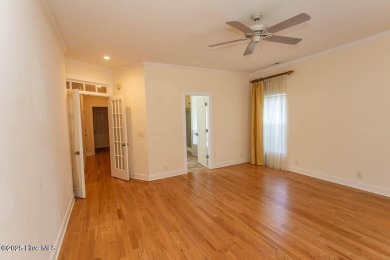 Proudly presenting this low-maintenance brick home located on on Ocean Ridge Plantation in North Carolina - for sale on GolfHomes.com, golf home, golf lot