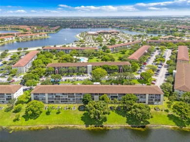 Immaculately kept in the sought after community of Century on Flamingo Lakes Country Club in Florida - for sale on GolfHomes.com, golf home, golf lot