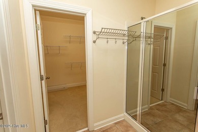 Proudly presenting this low-maintenance brick home located on on Ocean Ridge Plantation in North Carolina - for sale on GolfHomes.com, golf home, golf lot