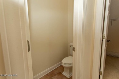 Proudly presenting this low-maintenance brick home located on on Ocean Ridge Plantation in North Carolina - for sale on GolfHomes.com, golf home, golf lot