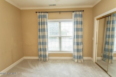 Proudly presenting this low-maintenance brick home located on on Ocean Ridge Plantation in North Carolina - for sale on GolfHomes.com, golf home, golf lot