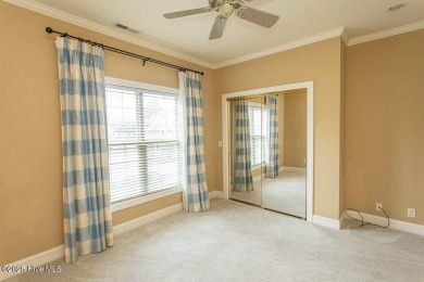Proudly presenting this low-maintenance brick home located on on Ocean Ridge Plantation in North Carolina - for sale on GolfHomes.com, golf home, golf lot