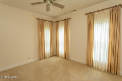 Proudly presenting this low-maintenance brick home located on on Ocean Ridge Plantation in North Carolina - for sale on GolfHomes.com, golf home, golf lot