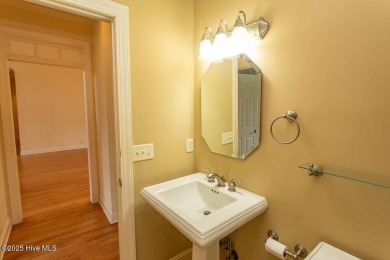Proudly presenting this low-maintenance brick home located on on Ocean Ridge Plantation in North Carolina - for sale on GolfHomes.com, golf home, golf lot