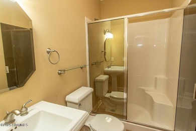 Proudly presenting this low-maintenance brick home located on on Ocean Ridge Plantation in North Carolina - for sale on GolfHomes.com, golf home, golf lot