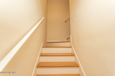 Proudly presenting this low-maintenance brick home located on on Ocean Ridge Plantation in North Carolina - for sale on GolfHomes.com, golf home, golf lot