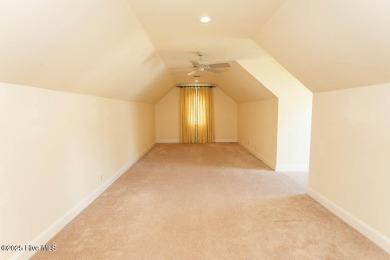 Proudly presenting this low-maintenance brick home located on on Ocean Ridge Plantation in North Carolina - for sale on GolfHomes.com, golf home, golf lot