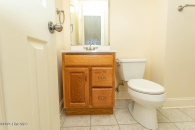 Proudly presenting this low-maintenance brick home located on on Ocean Ridge Plantation in North Carolina - for sale on GolfHomes.com, golf home, golf lot