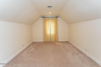 Proudly presenting this low-maintenance brick home located on on Ocean Ridge Plantation in North Carolina - for sale on GolfHomes.com, golf home, golf lot