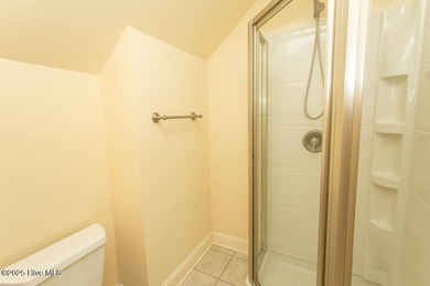 Proudly presenting this low-maintenance brick home located on on Ocean Ridge Plantation in North Carolina - for sale on GolfHomes.com, golf home, golf lot