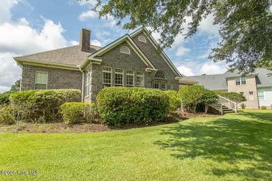 Proudly presenting this low-maintenance brick home located on on Ocean Ridge Plantation in North Carolina - for sale on GolfHomes.com, golf home, golf lot