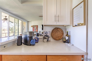 Home-in-One. This luxurious 2-bedroom 2 bath condo overlooks the on Yuma Golf and Country Club in Arizona - for sale on GolfHomes.com, golf home, golf lot