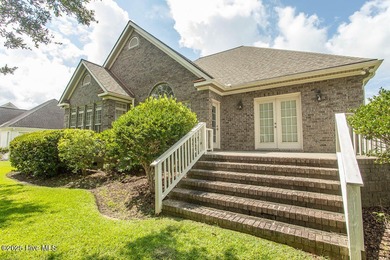 Proudly presenting this low-maintenance brick home located on on Ocean Ridge Plantation in North Carolina - for sale on GolfHomes.com, golf home, golf lot