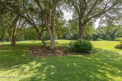 Proudly presenting this low-maintenance brick home located on on Ocean Ridge Plantation in North Carolina - for sale on GolfHomes.com, golf home, golf lot