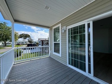 Brand-New 2026 Model Home in Barefoot Bay! Step into modern on Barefoot Bay Golf Course in Florida - for sale on GolfHomes.com, golf home, golf lot