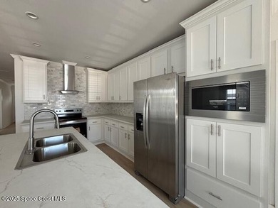 Brand-New 2026 Model Home in Barefoot Bay! Step into modern on Barefoot Bay Golf Course in Florida - for sale on GolfHomes.com, golf home, golf lot