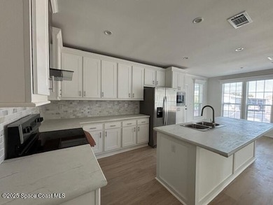 Brand-New 2026 Model Home in Barefoot Bay! Step into modern on Barefoot Bay Golf Course in Florida - for sale on GolfHomes.com, golf home, golf lot