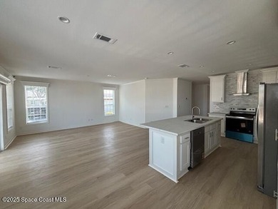 Brand-New 2026 Model Home in Barefoot Bay! Step into modern on Barefoot Bay Golf Course in Florida - for sale on GolfHomes.com, golf home, golf lot