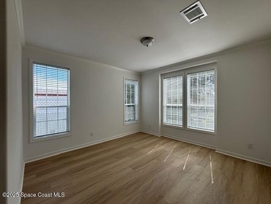 Brand-New 2026 Model Home in Barefoot Bay! Step into modern on Barefoot Bay Golf Course in Florida - for sale on GolfHomes.com, golf home, golf lot