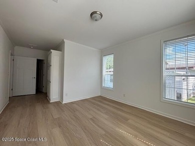 Brand-New 2026 Model Home in Barefoot Bay! Step into modern on Barefoot Bay Golf Course in Florida - for sale on GolfHomes.com, golf home, golf lot