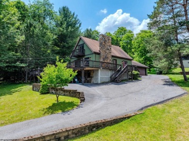 Welcome to 'Lake Reflections', a beautiful chalet nestled within on Alpine Lake Resort in West Virginia - for sale on GolfHomes.com, golf home, golf lot
