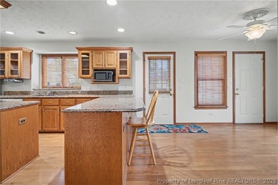 Spacious and versatile home located in the gated, amenity-rich on Carolina Lakes Country Club in North Carolina - for sale on GolfHomes.com, golf home, golf lot