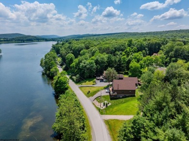 Welcome to 'Lake Reflections', a beautiful chalet nestled within on Alpine Lake Resort in West Virginia - for sale on GolfHomes.com, golf home, golf lot