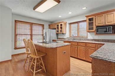 Spacious and versatile home located in the gated, amenity-rich on Carolina Lakes Country Club in North Carolina - for sale on GolfHomes.com, golf home, golf lot