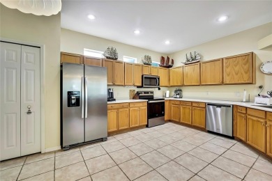Welcome to this warm and inviting home located in The Groves on The Groves Golf and Country Club in Florida - for sale on GolfHomes.com, golf home, golf lot