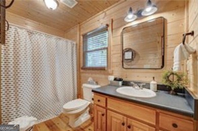 Riverfront living at it's finest with 110 feet of river frontage on White Path Golf Club in Georgia - for sale on GolfHomes.com, golf home, golf lot