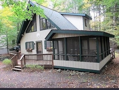 Your Forest Retreat: Enchanting Chalet in The Hideout 3 Bedrooms on The Hideout Golf in Pennsylvania - for sale on GolfHomes.com, golf home, golf lot