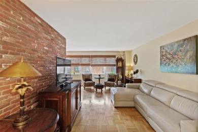 Enter through a welcoming foyer into a large living room on Leewood Golf Club in New York - for sale on GolfHomes.com, golf home, golf lot