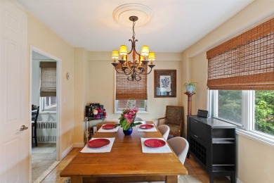 Enter through a welcoming foyer into a large living room on Leewood Golf Club in New York - for sale on GolfHomes.com, golf home, golf lot