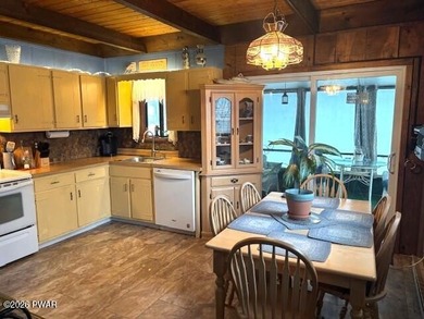 Your Forest Retreat: Enchanting Chalet in The Hideout 3 Bedrooms on The Hideout Golf in Pennsylvania - for sale on GolfHomes.com, golf home, golf lot