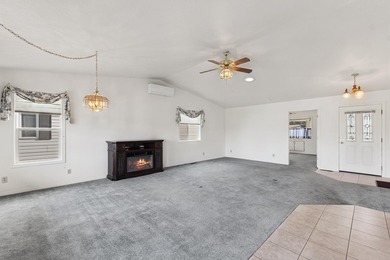 This home and location blends an active leisure lifestyle with on Village Greens Golf Club in Montana - for sale on GolfHomes.com, golf home, golf lot