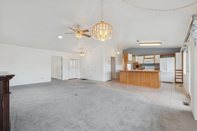 This home and location blends an active leisure lifestyle with on Village Greens Golf Club in Montana - for sale on GolfHomes.com, golf home, golf lot