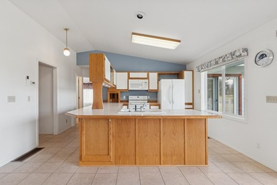 This home and location blends an active leisure lifestyle with on Village Greens Golf Club in Montana - for sale on GolfHomes.com, golf home, golf lot