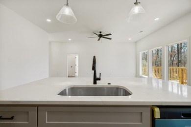 This 3 bedroom/ 2 bathroom new construction home in Diamondhead on Diamondhead Golf and Country Club in Arkansas - for sale on GolfHomes.com, golf home, golf lot