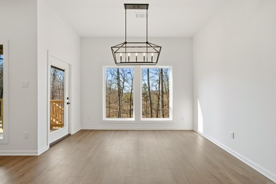 This 3 bedroom/ 2 bathroom new construction home in Diamondhead on Diamondhead Golf and Country Club in Arkansas - for sale on GolfHomes.com, golf home, golf lot