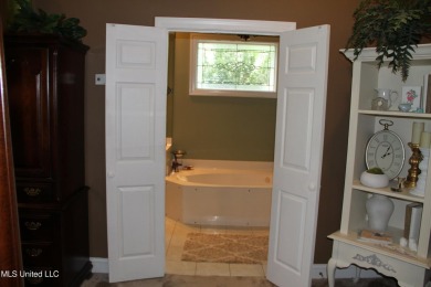 A beautiful 1 owner home built in 1995 located on the fairway of on Colonial Country Club Deerfield in Mississippi - for sale on GolfHomes.com, golf home, golf lot