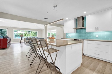 Situated on a nearly half-acre, fully fenced lot in a quiet on Pine Tree Golf Club in Florida - for sale on GolfHomes.com, golf home, golf lot